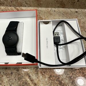 Black Fitness Tracker with USB Charger